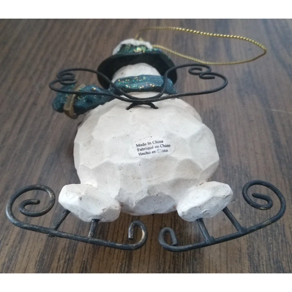 Skating Snowman Stone And Metal Christmas Ornament